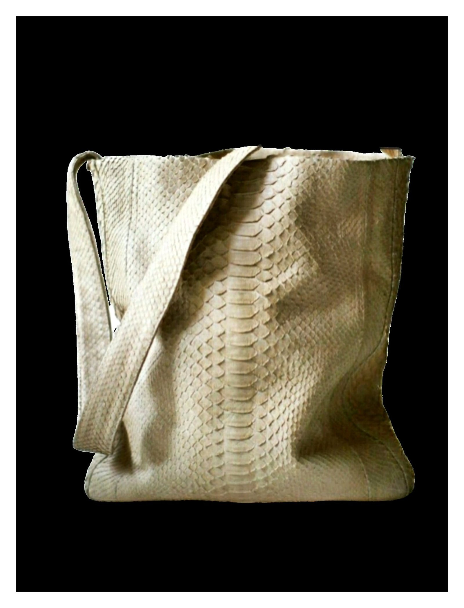 Atelier display — finished pieces in natural python